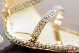 Buy shoes for 158.000 euros